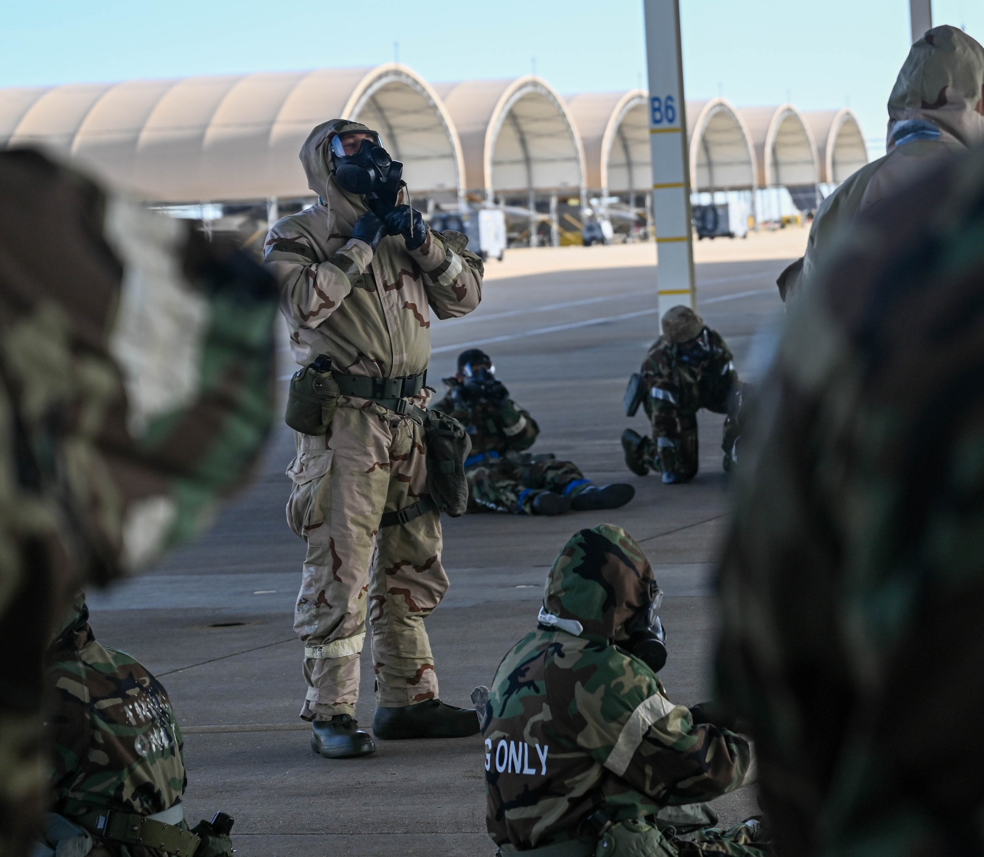 Airmen geared up during a CBRN exercise