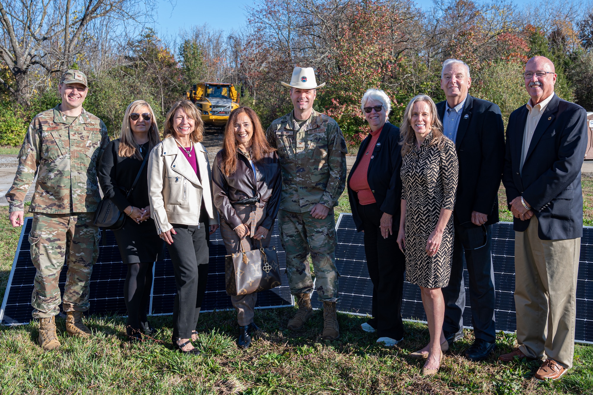 U.S. Air Force Col. Wes Adams, U.S. Air Force Col. David Jokinen and honorary commanders pose for a photo during the energy infrastructure and resilience groundbreaking ceremony.