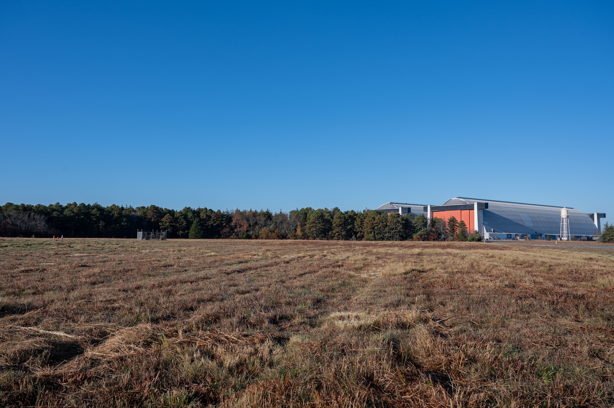 Ground mounted solar arrays will be placed on this Naval Support Activity Lakehurst field.