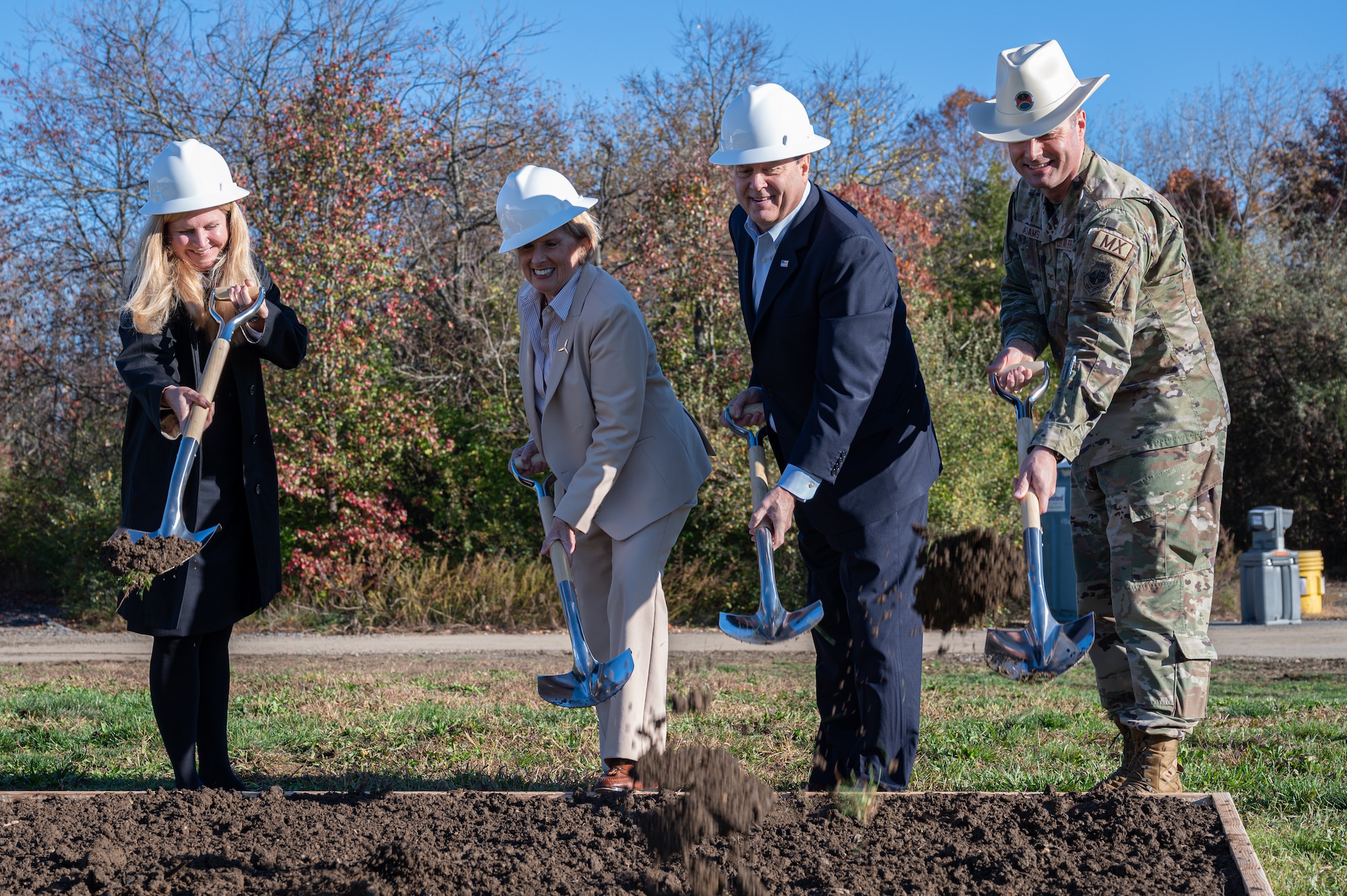 Joint base commander and honorary commanders complete ceremonial "first dig"