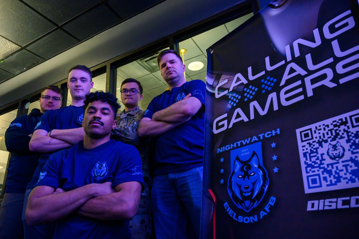 Members of the Eielson Air Force Gaming team pose for a group photo during a gaming tournament on Eielson Air Force Base, Alaska, Oct. 27, 2022.
