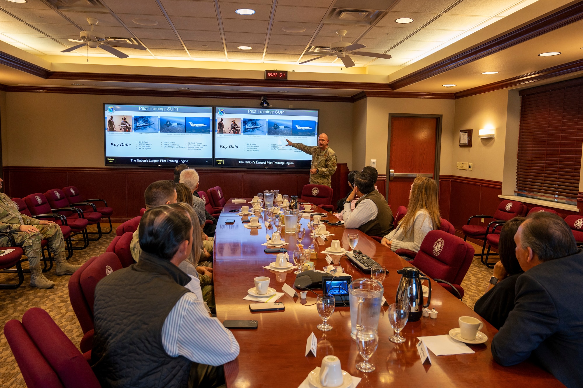 U.S. Air Force Col. Kevin Davidson, 47th Flying Training Wing commander, explains the wing’s mission to Al Arreola, Mayor of Del Rio, Texas, John Sheedy, City Manager of Del Rio, Emilio de Hoyos, Mayor of Ciudad Acuna, Mexico, and Paloma Villasenor Vargas, Consul of Mexico in Del Rio, as well as other Distinguished Visitors from Del Rio and Ciudad Acuna at Laughlin Air Force Base, Texas, Nov. 1, 2022. Laughlin’s mission is to develop U.S. Air Force pilots and the base relies on support from the local community to make that mission a success. Familiarization tours cultivate understating of the wing’s mission and help forge lasting partnerships in the community.  (U.S. Air Force photo by Senior Airman Nicholas Larsen)
