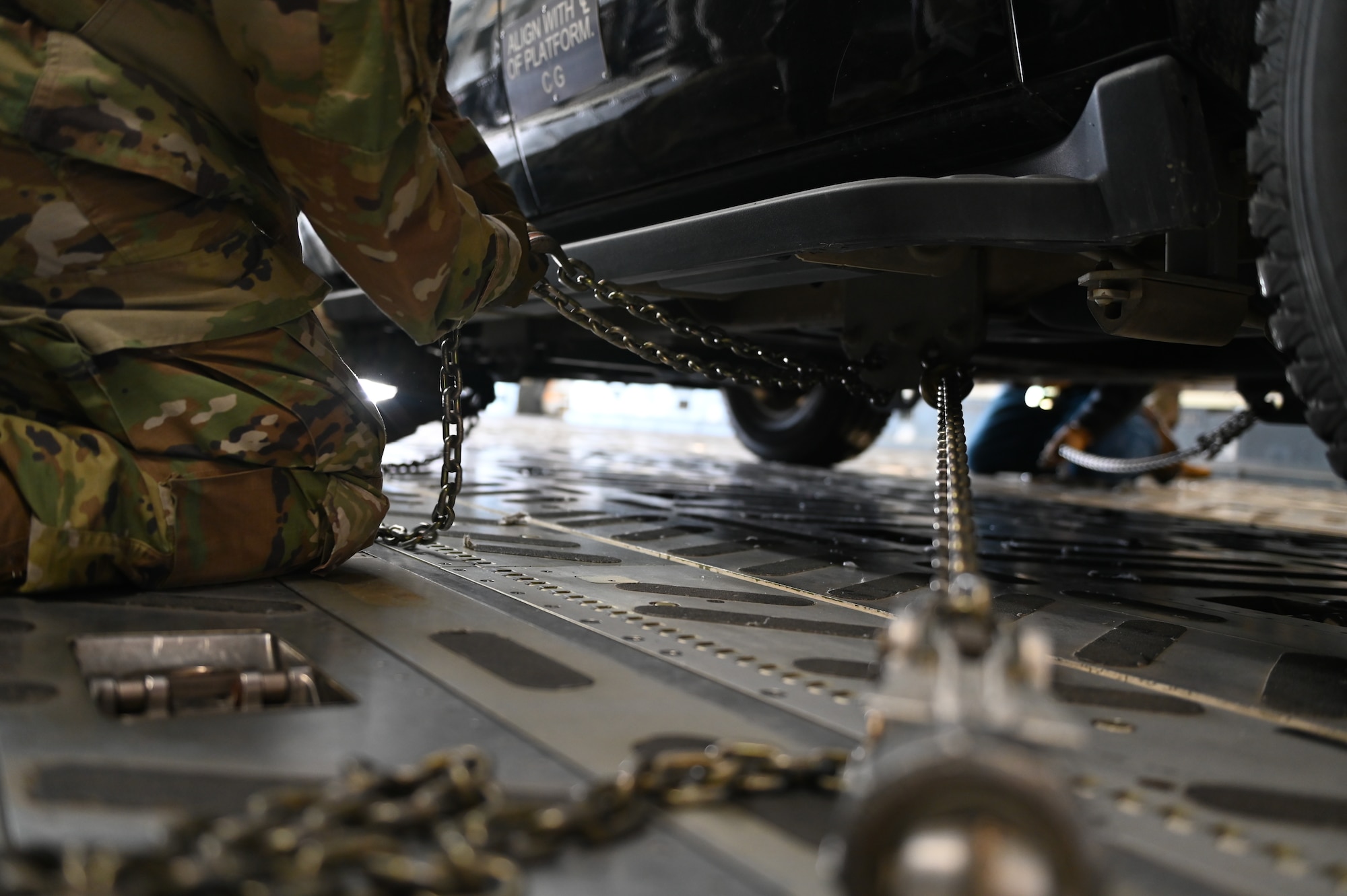 An Emergency Response Vehicle is uploaded and secured into a C-17 Globemaster III for transport