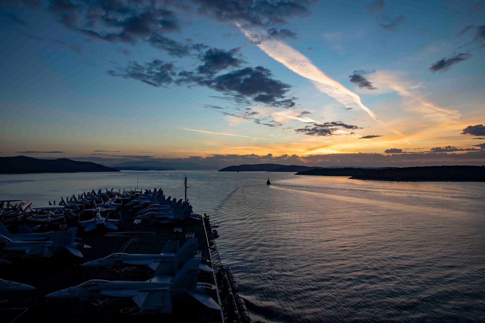 221103-N-UI066-1013 SPLIT, Croatia (Nov. 3, 2022) The Nimitz-class aircraft carrier USS George H.W. Bush (CVN 77), along with the embarked staff of Carrier Strike Group (CSG) 10, arrives in Split, Croatia, for a scheduled port visit Nov. 3, 2022. The George H.W. Bush CSG is on a scheduled deployment in the U.S. Naval Forces Europe area of operations, employed by U.S. Sixth Fleet to defend U.S., allied, and partner interests. (U.S. Navy photo by Mass Communication Specialist Seaman Chandler Ludke)