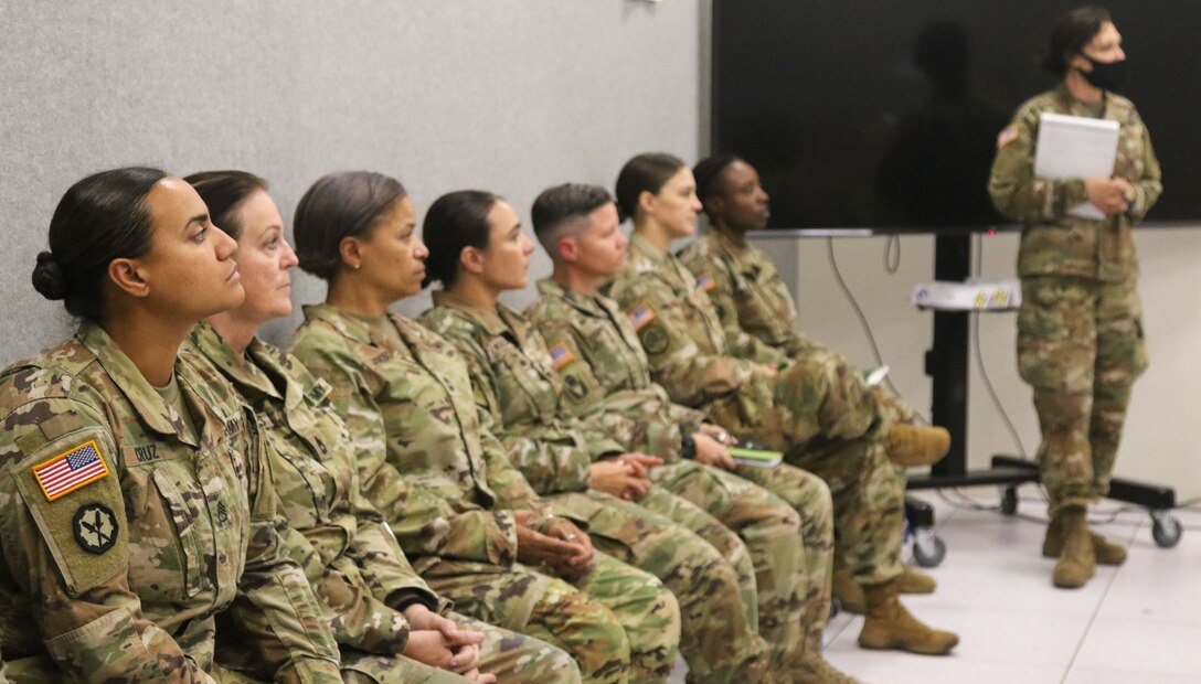 Soldiers listen to trainer