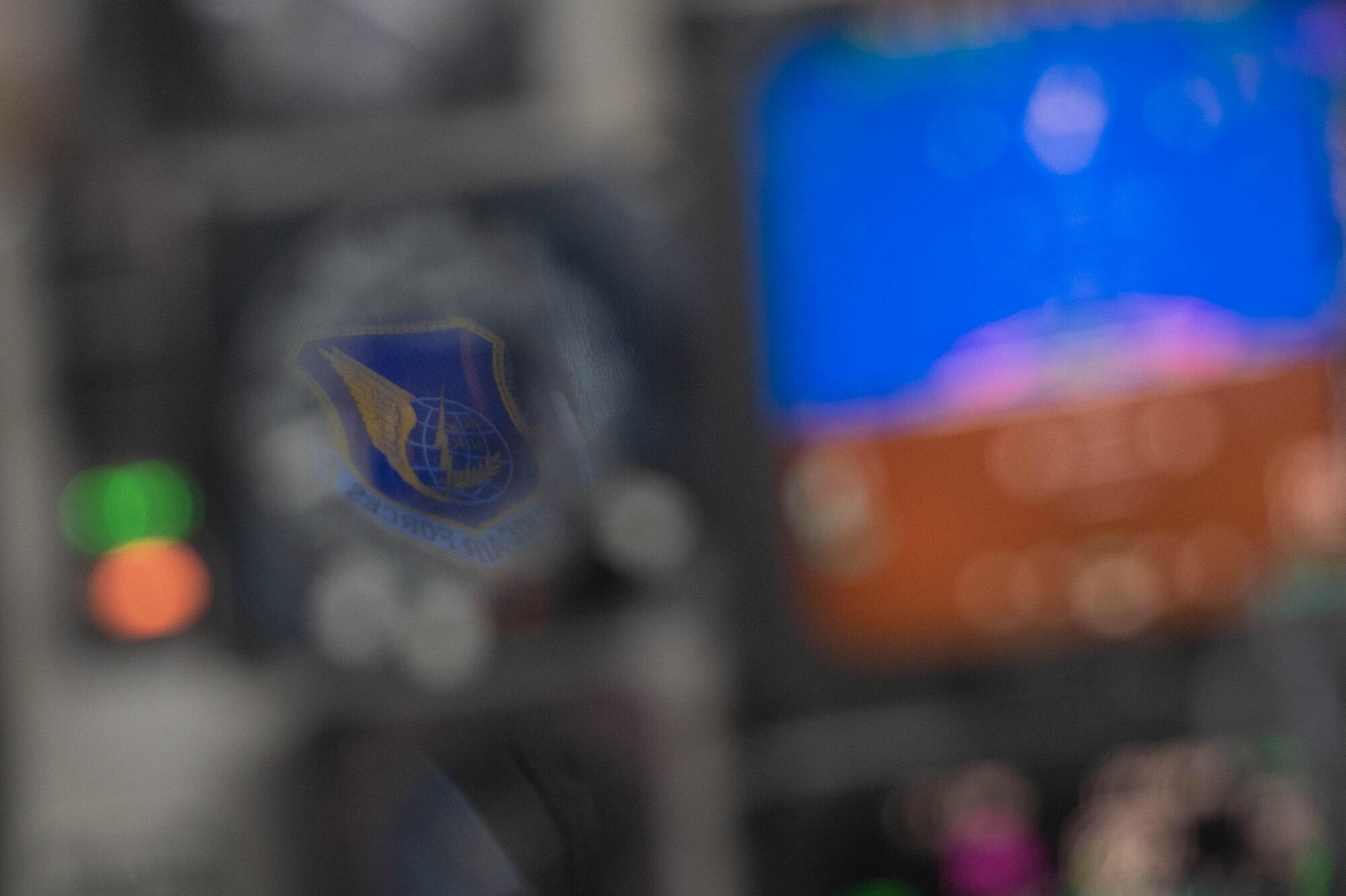 A patch is reflected in some glass.