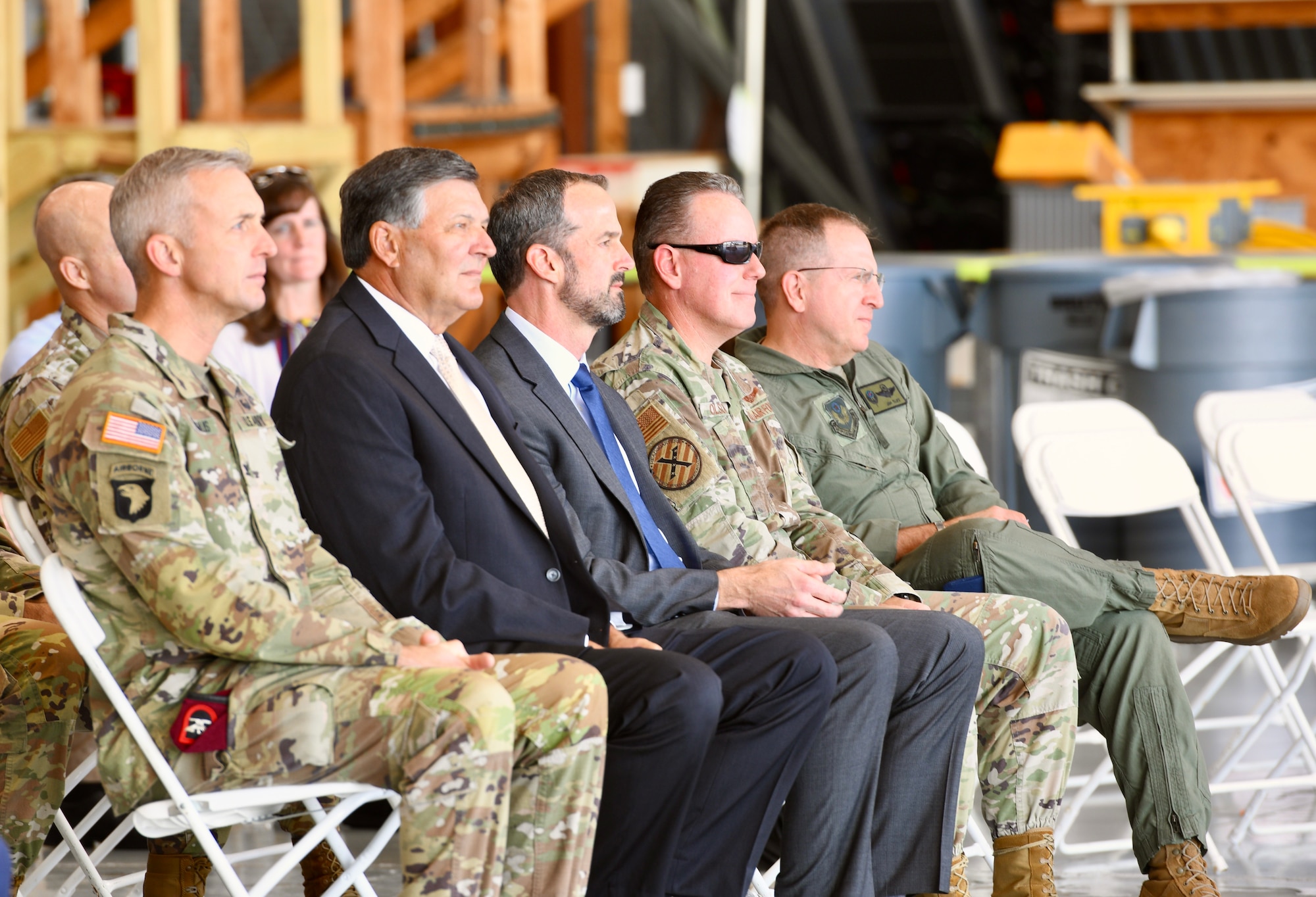 Members of the US Air Force leadership team listen as speakers talk about the AC-130J Ghostrider at the dedication and delivery ceremony Nov. 2, 2022, at Bob Sikes Airport in Crestview, Florida. The AC-130J is a fifth-generation gunship that provides close air support, air interdiction and armed reconnaissance.