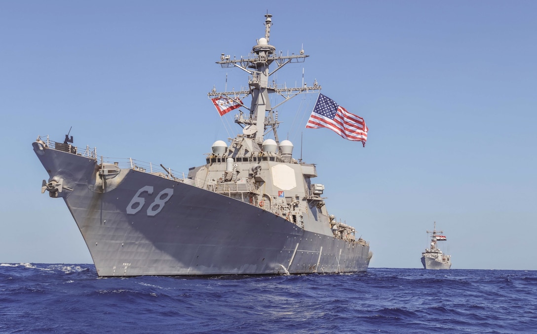 RED SEA (Nov. 2, 2022) Guided-missile destroyer USS The Sullivans (DDG 68) sails alongside Egyptian Navy frigate ENS Alexandria (F911) in the Red Sea, Nov. 2. The Sullivans is deployed to the U.S. 5th Fleet area of operations to help ensure maritime security and stability in the Middle East region. (U.S. Navy photo by Lt.j.g. Kelly Harris)
