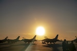 U.S. Air Force F-16 Fighting Falcons assigned to the Ohio National Guard's 180th Fighter Wing sit on the flightline before morning training flights at Naval Air Station Key West, Florida, Oct. 31, 2022. The 180FW deployed to Key West to train with VFC-111, the Navy's premier adversary squadron, providing realistic training scenarios that ensure the 180FW is prepared for homeland defense and contingency operations around the globe.