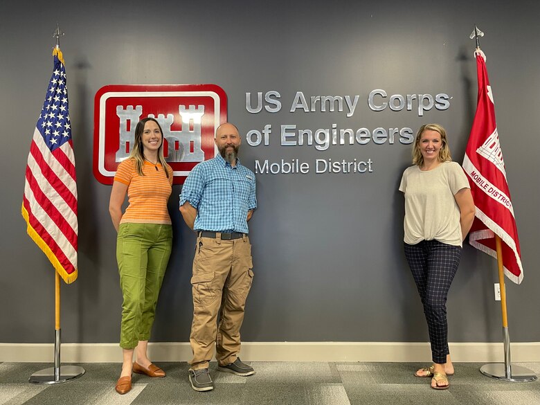 Ashley Leflore, U.S. Army Corps of Engineers, Mobile District’s Emergency Management chief (far right), and her team members Callie Russell and Dehyrl Middleton pose for a team photo in Mobile, Alabama, Sept. 15, 2022. Leflore and her team have all deployed to support multiple response and recovery missions since she has taken over the team. (Courtesy photo)