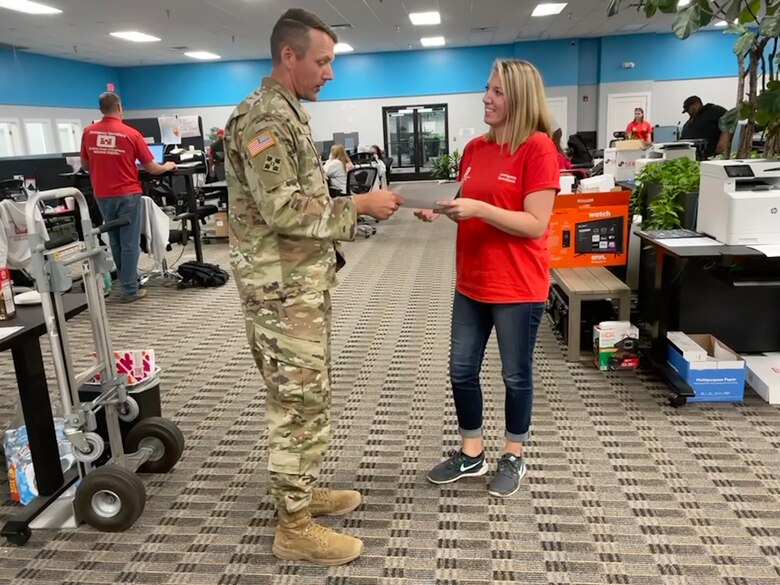 Ashley Leflore, U.S. Army Corps of Engineers Mobile District’s Emergency Management chief, discusses a report with Maj. Rocky Streif, Vicksburg District deputy commander, during a deployment in response to Hurricane Ian relief in Sarasota, Florida, Oct. 26, 2022. The Emergency Management team deploys to support response and recovery missions like Hurricane Ian and other natural disasters. (Courtesy photo)