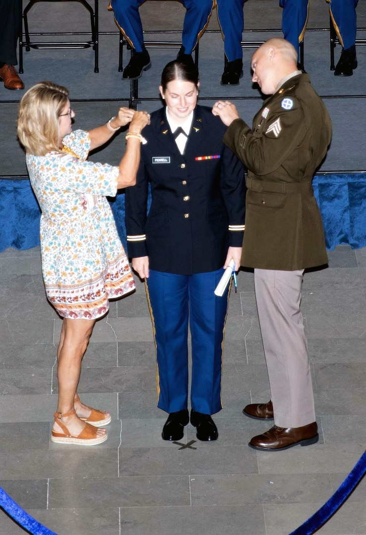 Emily Pickerell, Missouri Army National Guard, is pinned as a 2nd Lieutenant during the graduation of Officer Candidate Class 60. The ceremony was held in the Missouri State Capital building's rotunda on 10 September, 2022.
