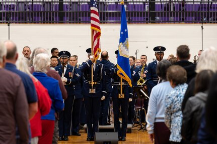Members of the U.S. Air Force Honor Guard stand at attention during colors at The United States Air Force Band’s Fall Tour concert at South Eugene High School, Eugene, Ore., Oct. 26, 2022. The Band’s live performances attracted thousands of audience members from across the Pacific Northwest region. (U.S. Air Force photo by Kristen Wong)
