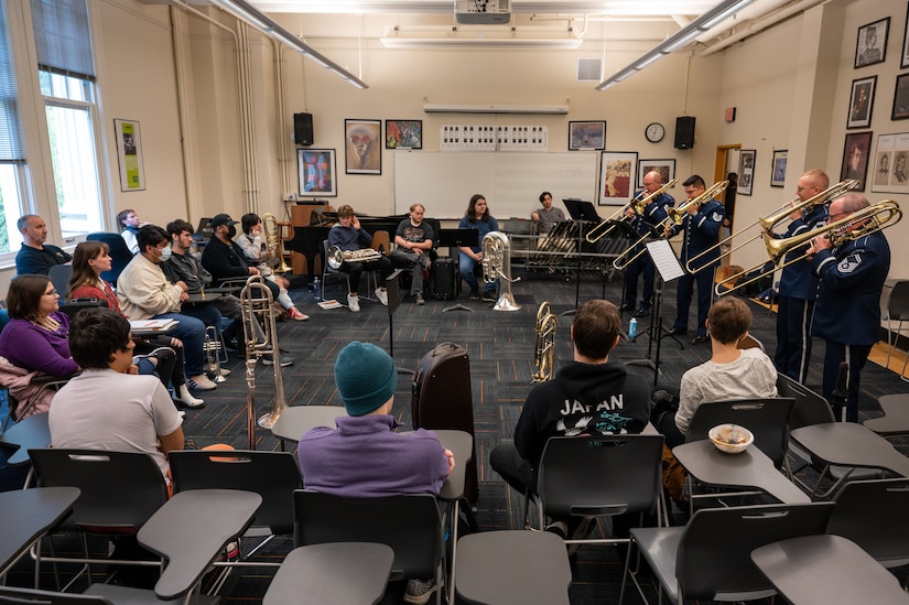 The trombone section of The United States Air Force Band’s Concert Band teach a master class to music students at Portland State University, Portland, Ore., Oct. 25, 2022. The Band’s mission is to honor those who have served, inspire American citizens to heightened patriotism and service, and positively impact the global community on behalf of the U.S. Air Force and the United States of America. (U.S. Air Force photo by Kristen Wong)