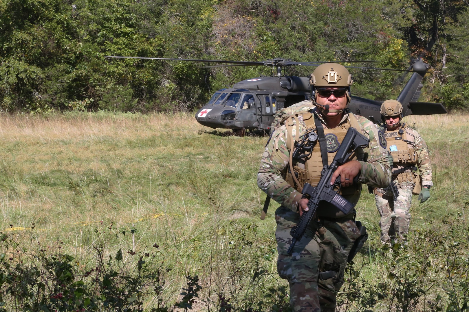 Joint training exercise with Det. 2, Co. G, 3/238th Aviation MEDEVAC, Cox Health and Missouri State Highway Patrol at Hercules Glade Wilderness, Bradleyville, Mo., Oct. 06, 2022. Multiple Missouri departments teamed up to practice life-saving MEDEVAC scenarios. (Photo by U.S. Army National Guard Spc. Rose Di Trolio.)