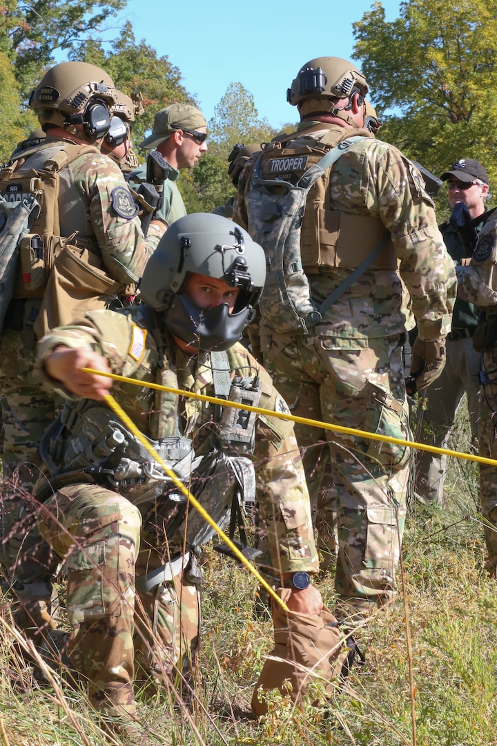 Joint training exercise with Det. 2, Co. G, 3/238th Aviation MEDEVAC, Cox Health and Missouri State Highway Patrol at Hercules Glade Wilderness, Bradleyville, Mo., Oct. 06, 2022. Multiple Missouri departments teamed up to practice life-saving MEDEVAC scenarios. (Photo by U.S. Army National Guard Spc. Rose Di Trolio.)