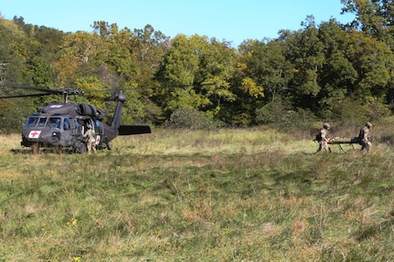 Joint training exercise with Det. 2, Co. G, 3/238th Aviation MEDEVAC, Cox Health and Missouri State Highway Patrol at Hercules Glade Wilderness, Bradleyville, Mo., Oct. 06, 2022. Multiple Missouri departments teamed up to practice life-saving MEDEVAC scenarios. (Photo by U.S. Army National Guard Spc. Rose Di Trolio.)