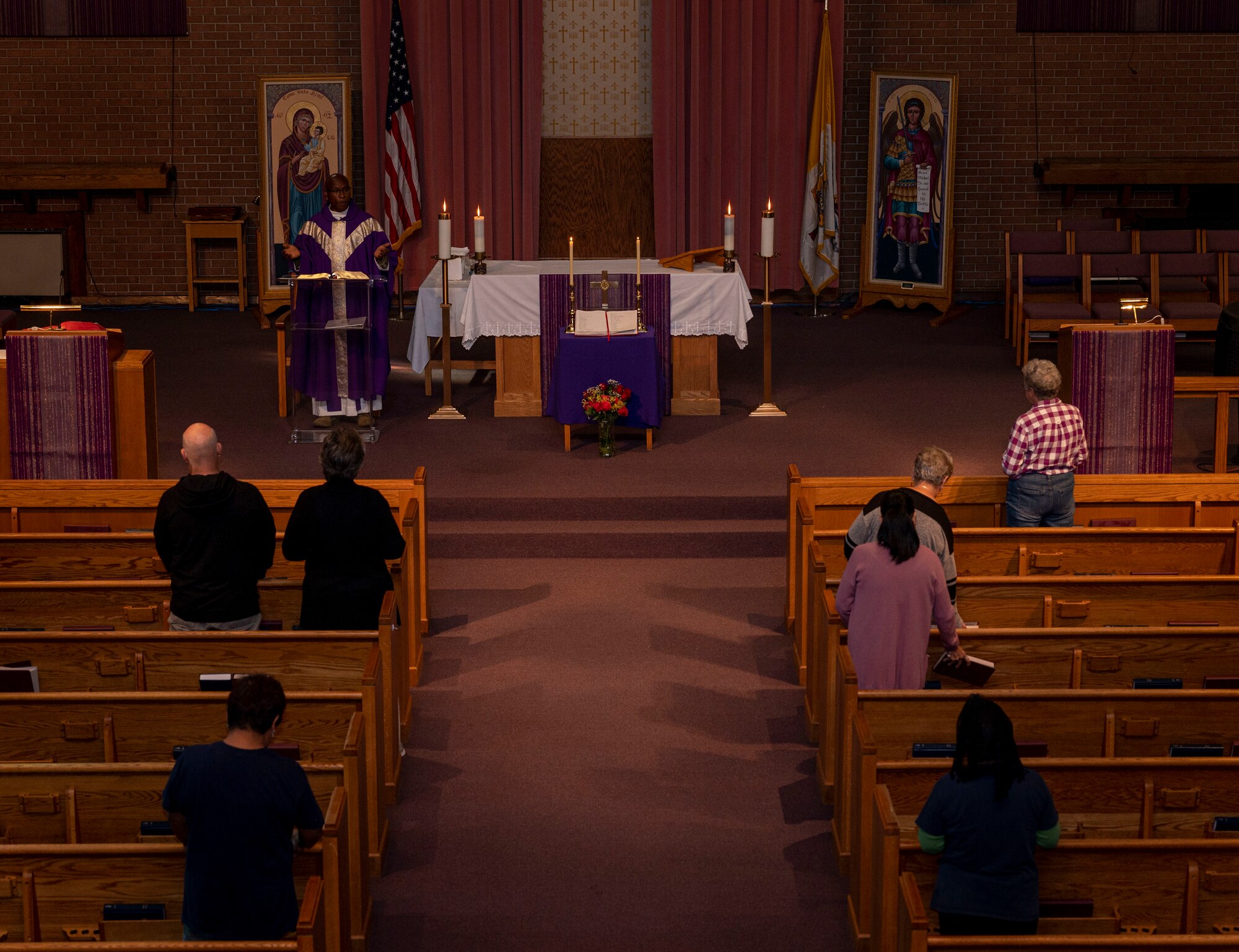 Chaplain Brendan Mbagwu, 4th Fighter Wing, conducts mass for Airmen and their families at Seymour Johnson Air Force Base, North Carolina, Nov. 2, 2022. The Chapel provides faith based services to allow for Airmen and their families to pursue various religious worship options. (U.S. Air Force Base photo by Airman 1st Class Sabrina Fuller)