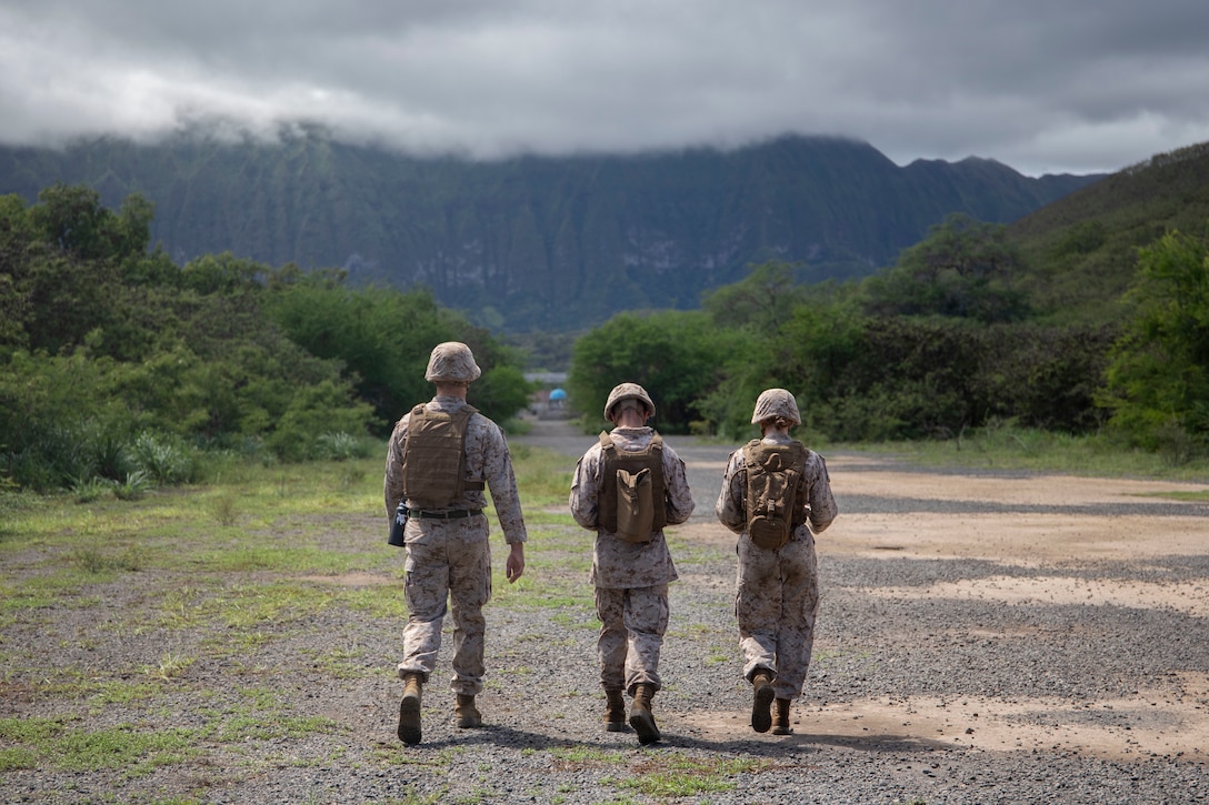 U.S. Marines with Marine Corps Air Station Kaneohe Bay conduct land navigation, Marine Corps Training Area Bellows, Hawaii, Oct. 14, 2022. The purpose of the training was to enhance land navigation skills, and familiarize Marines with proper procedures. (U.S. Marine Corps photo by Lance Cpl. Terry Stennett III)