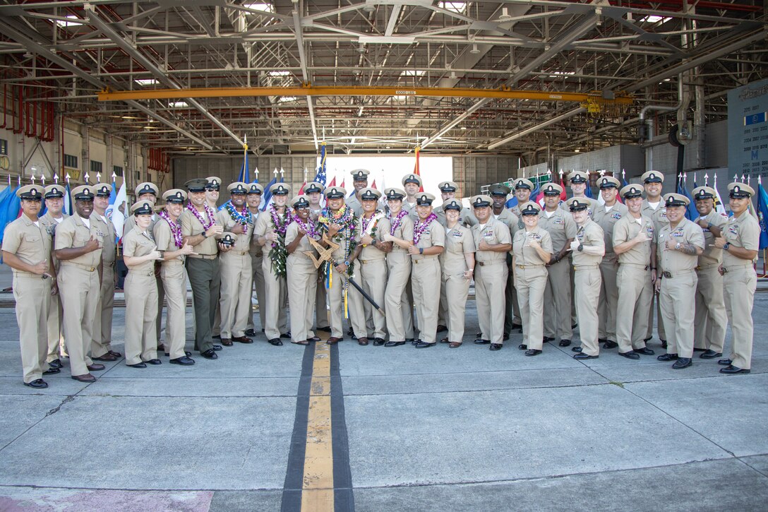U.S. Navy Sailors participate in a chief petty officer pinning ceremony, Marine Corps Base Hawaii, Oct. 21, 2022. The rank of chief petty officer was created April 1, 1893, and the chief petty officer pinning ceremony is a unique tradition to the U.S. Navy that signifies promotion to a crucial position of leadership and responsibility. (U.S. Marine Corps photo by Lance Cpl. Cody Purcell)