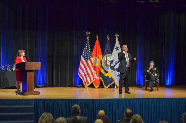 Mr. Jay Stefany, center, performing the duties of Assistant Secretary of the Navy for Research, Development and Acquisition ASN (RDA) and Vice. Adm. Frank Morley, right, principal military deputy to Assistant Secretary of the Navy for Research, Development and Acquisition ASN (RDA) participate in the Department of Navy 2022 Acquisition Excellence Awards ceremony, Nov. 3, 2022.