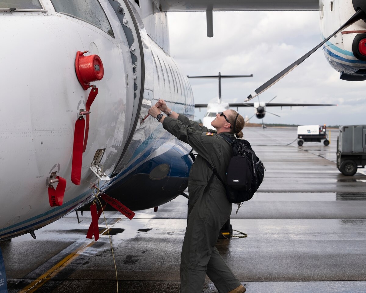 Maj. Molly Sexton conducts pre-flight inspections Oct. 25, 2022, at Hurlburt Field, Fla. The Aircrew Voluntary Acceptance of Risk provides female aircrew with the ability to make decisions based on their career experience, family needs, advice of their medical providers and commander's input. The AVAR has three separate sections: a risk acknowledgement page, outline of medical risks and flight profiles. (U.S. Air Force photo by Michelle Gigante)