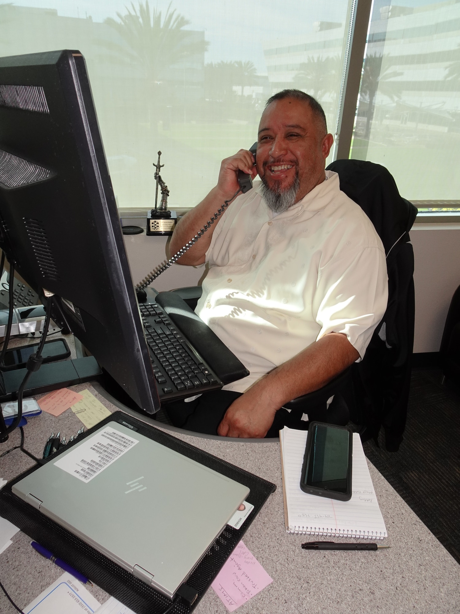 Moises “Mo” Rosales fields numerous requests as Flight Chief of Military Personnel, Space Base Delta 3 and Space Systems Command. His strong work ethic and leadership have resulted in numerous recognitions throughout his career. (U.S. Space Force Photo by Peter Anninos).