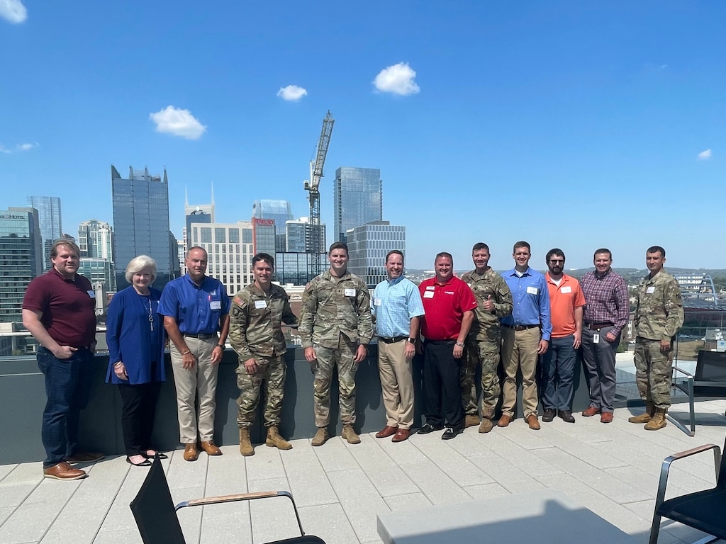 U.S. Army Corps of Engineers Nashville District leadership pose with members of the Society of American Military Engineers Nashville Post Sept. 21, 2022, at the headquarters building of Barge Design Solutions, Inc., in Nashville, Tennessee. The Nashville District provided program updates, review of current and upcoming projects, and provided a list of contracting opportunities to the group. (USACE Photo by Ron Collett)