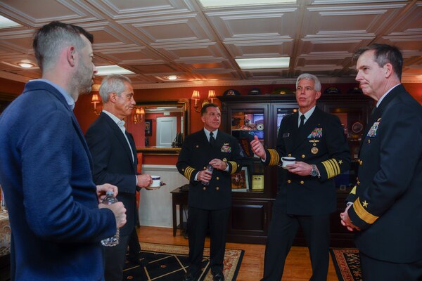 SAGAMI WAN (Nov. 6, 2022) The Honorable Rahm Emanuel, U.S. ambassador to Japan, Vice Adm. Karl Thomas, commander, U.S. 7th Fleet, Rear Adm. Buzz Donnelly, commander, Task Force 70, and Capt. Daryle Cardone, commanding officer of the U.S. Navy’s only forward-deployed aircraft carrier, USS Ronald Reagan (CVN 76), speak in the commanding officer’s in-port cabin during the Japan Maritime Self-Defense Force Fleet Review 2022, in the Sagami Wan, Nov. 6. Ronald Reagan, the flagship of Carrier Strike Group 5, provides a combat-ready force that protects and defends the United States, and supports alliances, partnerships and collective maritime interests in the Indo-Pacific region. (U.S. Navy photo by Mass Communication Specialist 3rd Class George Cardenas)