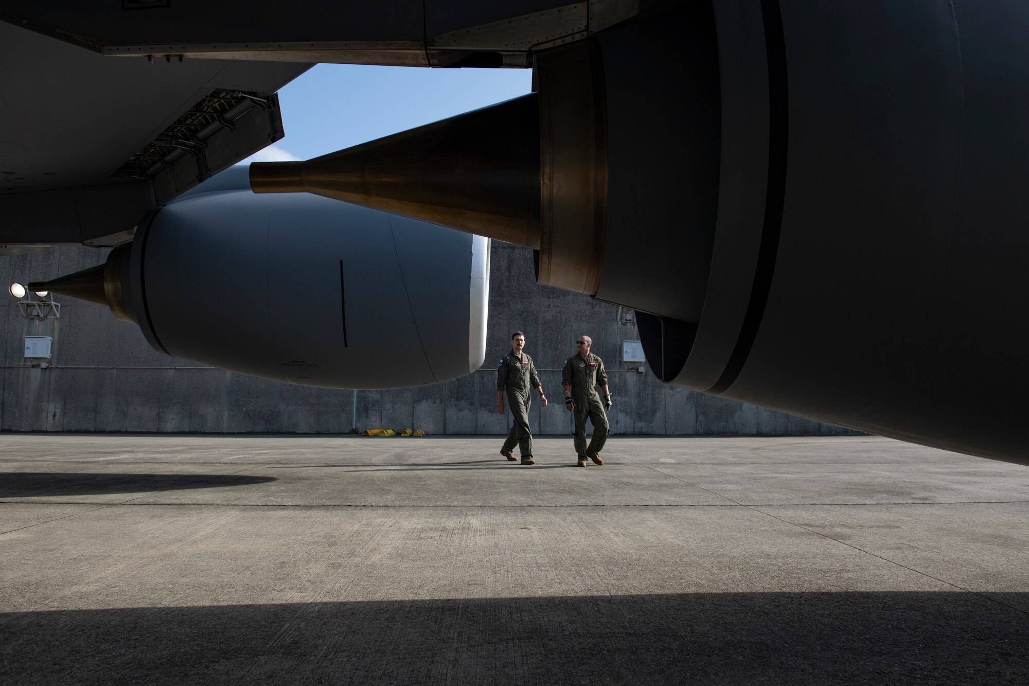 U.S. Air Force KC-135 Stratotanker pilots assigned to the 909th Air Refueling Squadron conduct pre-flight checks prior to flight in support of a joint training exercise over the Pacific Ocean, Oct. 24, 2022. Joint training improves interoperability among U.S. forces and enables more effective teamwork during real-world engagements. (U.S. Air Force photo by Senior Airman Jessi Roth)