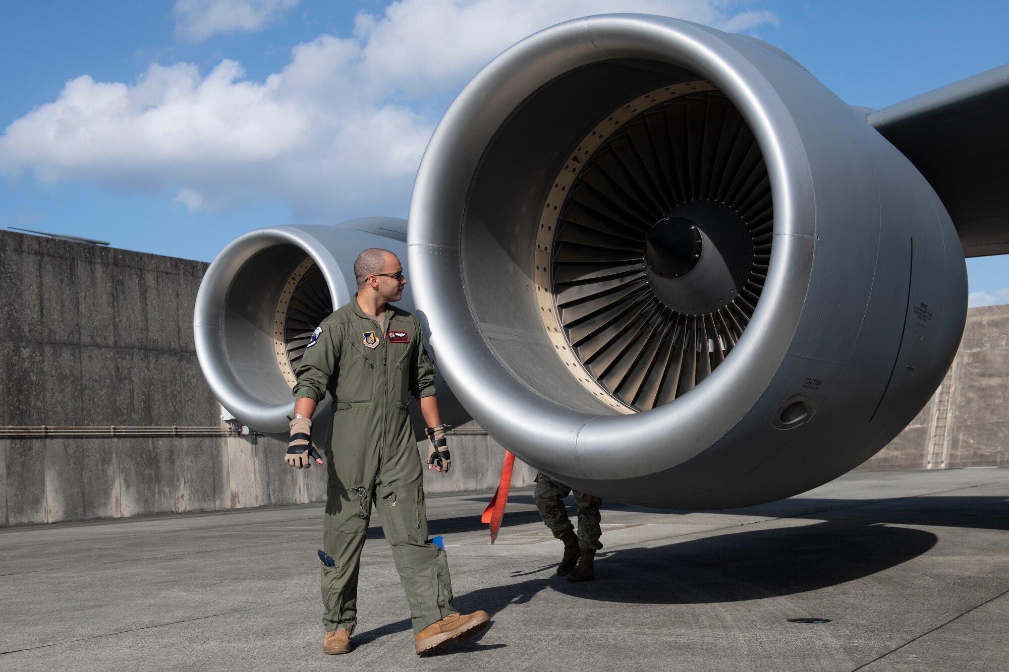 U.S. Air Force Maj. Michael Trott, 909th Air Refueling Squadron KC-135 Stratotanker pilot, conducts pre-flight checks prior to a flight in support of a joint training exercise over the Pacific Ocean, Oct. 24, 2022. Interoperability among U.S. military branches is vital to ensuring a free and open Indo-Pacific by demonstrating the ability to seamlessly integrate and accomplish the mission as one cohesive team. (U.S. Air Force photo by Senior Airman Jessi Roth)