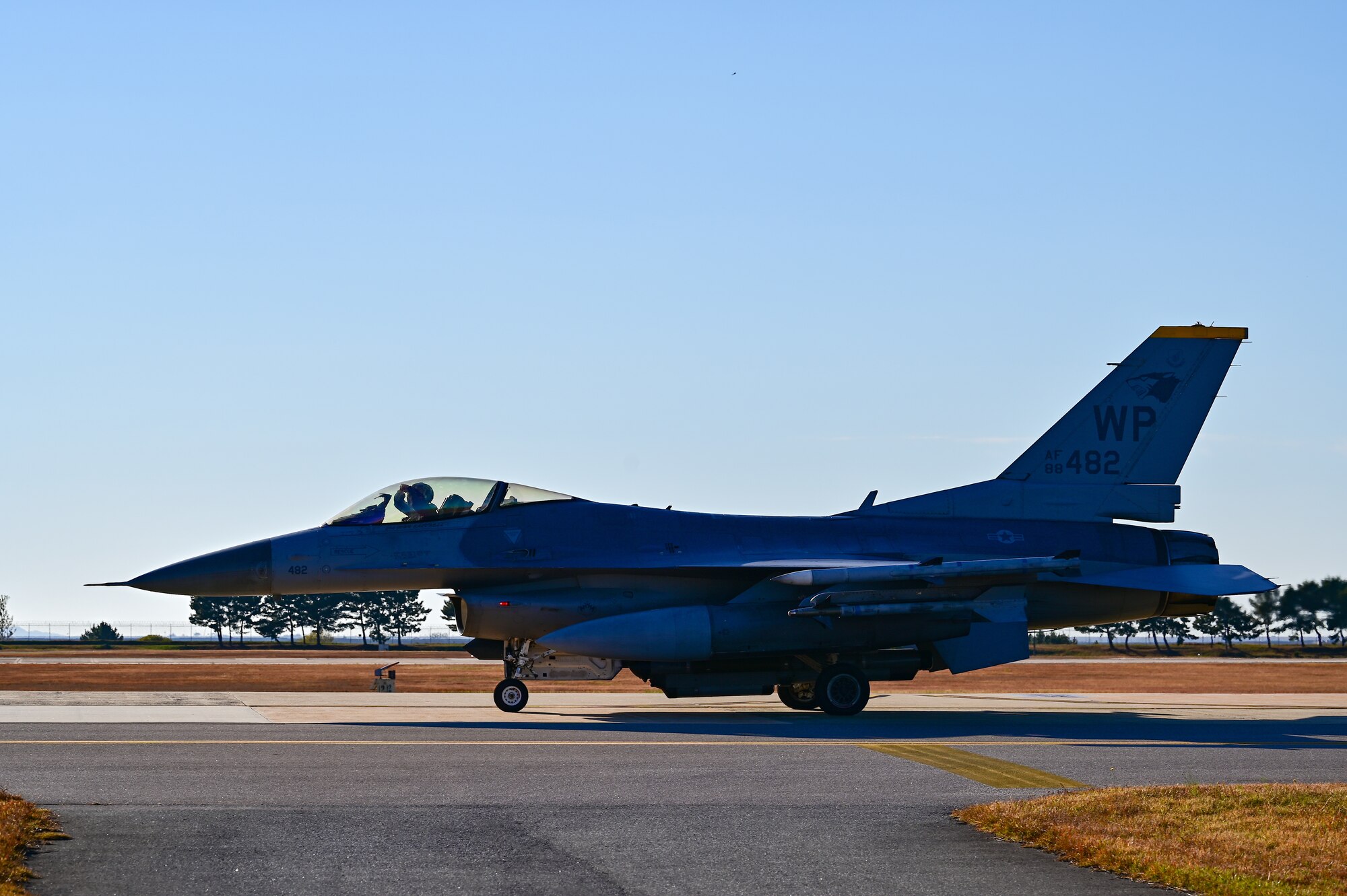An 80th Fighter Squadron F-16 Fighting Falcon taxis to the runway at Kunsan Air Base, Republic of Korea, Nov. 2, 2022. Both the 80th and 35th Fighter Squadrons participated in the peninsula-wide combined flying training event, VIGILANT STORM 23. (U.S. Air Force photo by Staff Sgt. Sadie Colbert)