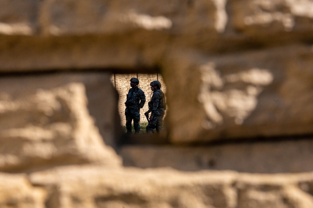 U.S. Air Force Airmen with the 633d Security Forces Squadron await instructions during the SF field exercise at Joint Base Langley-Eustis, Virginia, Nov. 1, 2022.