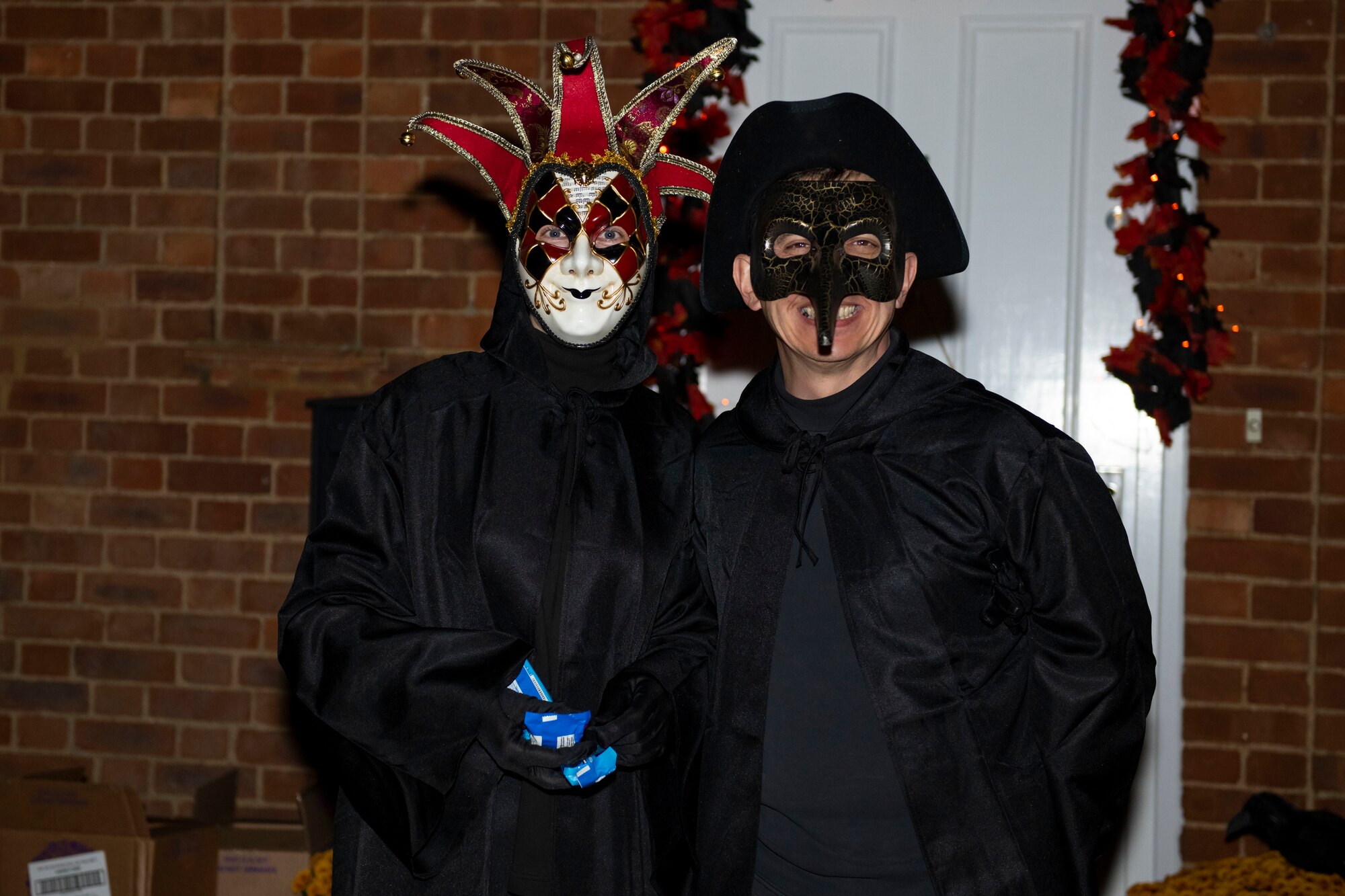 Hundreds of children dressed as ghosts, ghouls and goblins visit residences near RAF Croughton to celebrate Halloween with American personnel Oct. 31, 2022. Pumpkin patrol volunteers from Croughton worked together with the Ministry of Defence Police, Cherwell District Council and Thames Valley Police to help promote a safe and good time. Local American and multinational military and civilians participated in creating a special night for the local community near Croughton. (U.S. Air Force photo by Senior Airman Jennifer Zima)