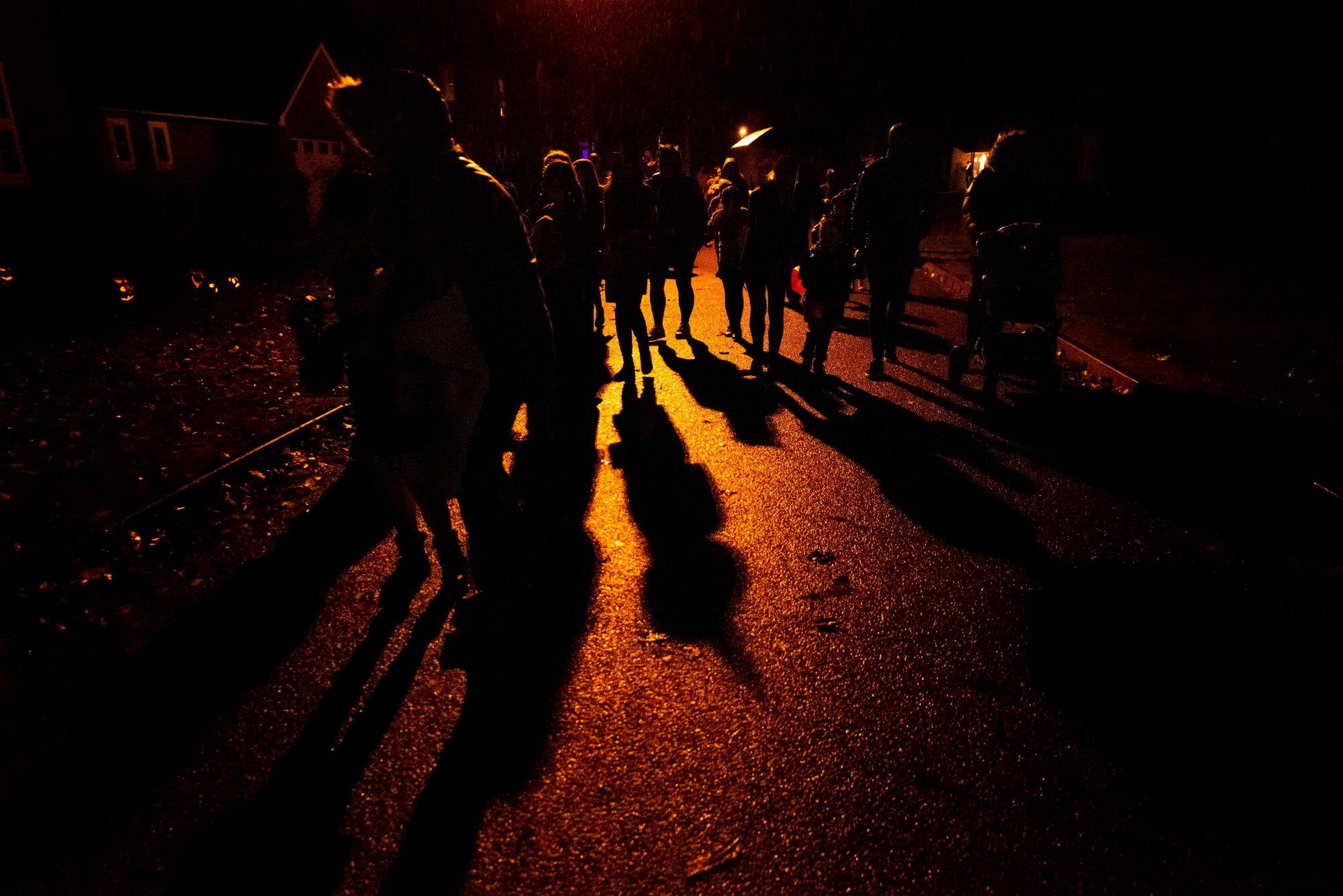 Hundreds of children dressed as ghosts, ghouls and goblins visit residences near RAF Croughton to celebrate Halloween with American personnel Oct. 31, 2022. Pumpkin patrol volunteers from Croughton worked together with the Ministry of Defence Police, Cherwell District Council and Thames Valley Police to help promote a safe and good time. Local American and multinational military and civilians participated in creating a special night for the local community near Croughton. (U.S. Air Force photo by Senior Airman Jennifer Zima)