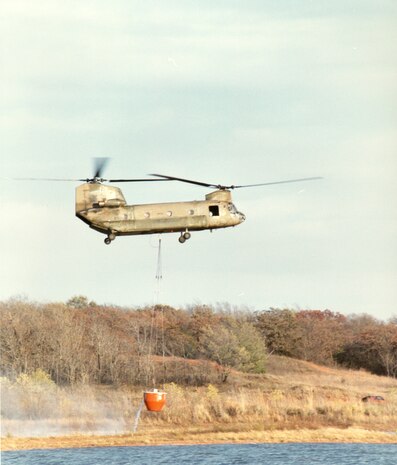Helicopter scooping water from Lake Draper4-1984 Fire
