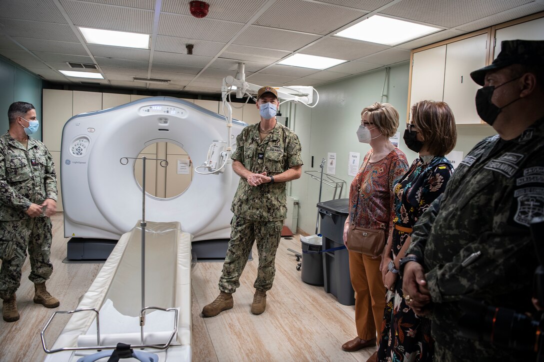 Capt. Charles Cather, assigned to the hospital ship USNS Comfort (T-AH 20), gives a tour of the ship to Honorale Laura F. Dogu, U.S. Ambassador to Honduras, Governor Alexa Solorzano and Vice Adm. Jose Jorge Fortin Aguilar, Honduras Chief of Defense, Nov. 5, 2022.