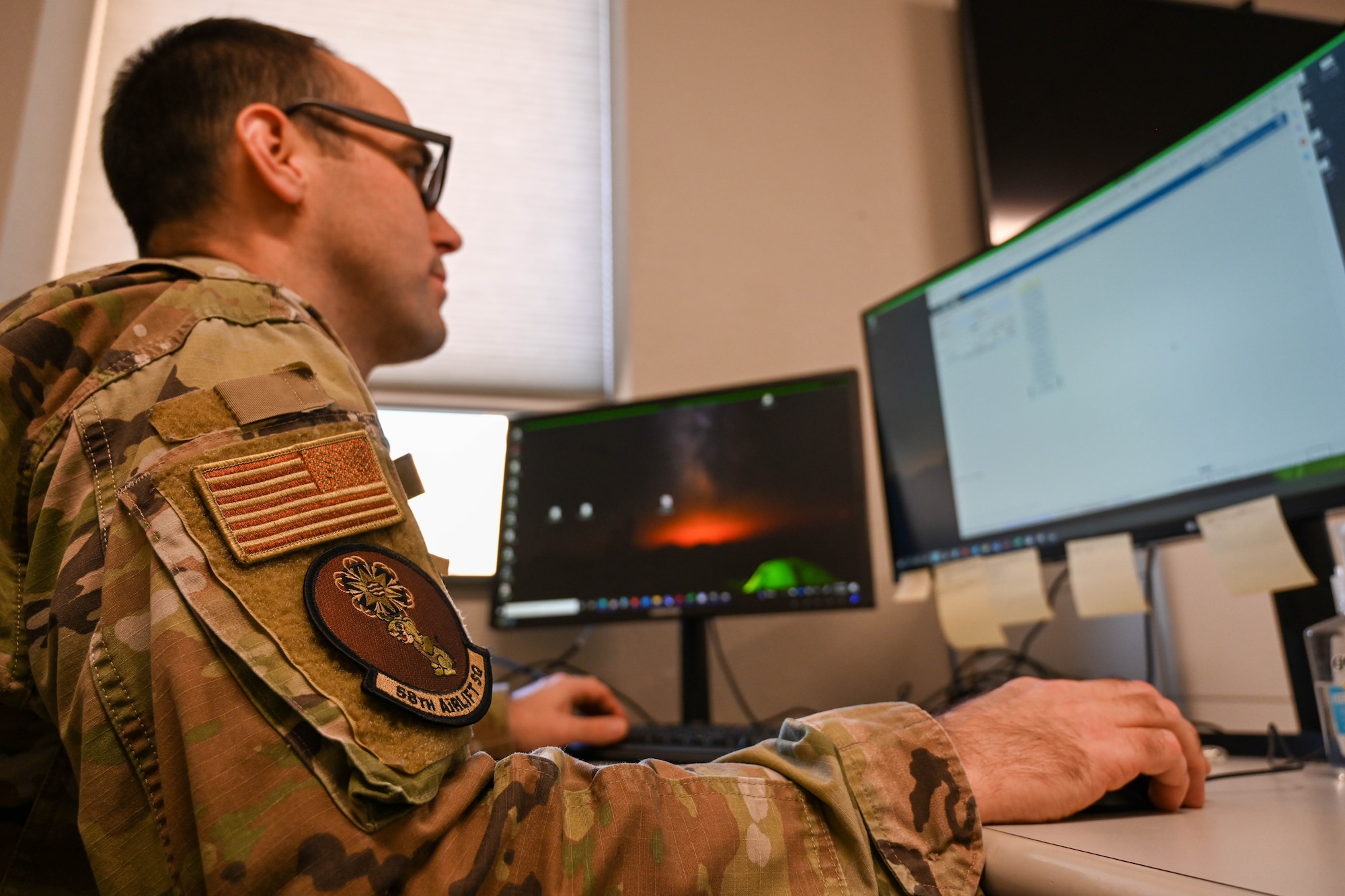 Senior Airman Richard Radtkin, 58th Airlift Squadron Squadron Aviation Resource Management (SARM) non-commissioned officer in charge, works on his computer at Altus Air Force Base, Oklahoma, Nov. 1, 2022. The self-named “One-Charlies” are interchangeable between the SARM and Host Aviation Resource Management offices. (U.S. Air Force photo by Senior Airman Trenton Jancze)