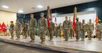 The 36th Sustainment Brigade, Texas National Guard, cased its flags, or colors, and the 369th Sustainment Brigade, New York National Guard, uncased its flags during a transfer of authority ceremony Nov. 3, 2022, at Camp Arifjan, Kuwait.