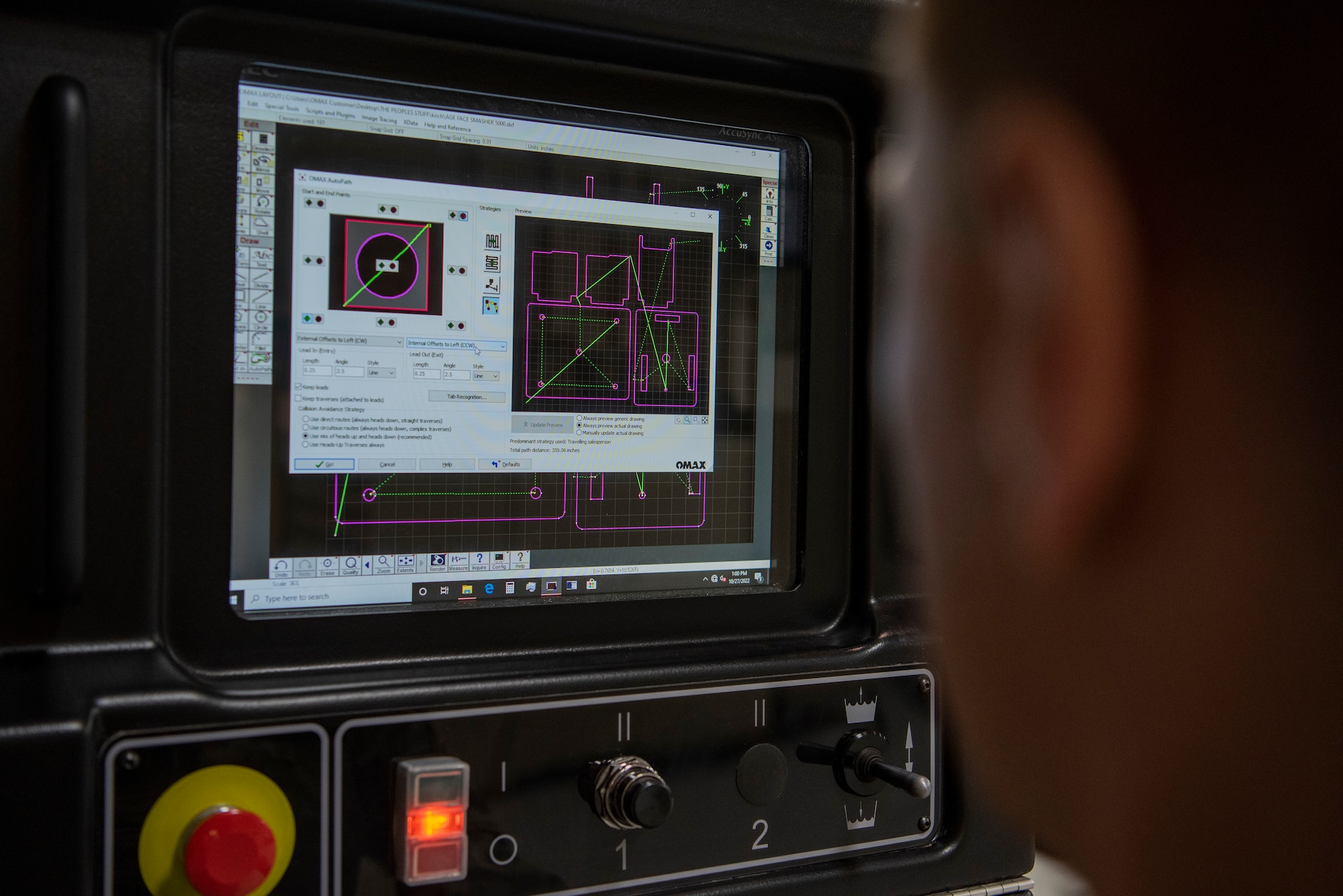 Staff Sgt. Rick Stotler, 7th Equipment Maintenance Squadron aircraft metals technology supervisor, inputs information on a water jet for the Face Saver 2000 at Dyess Air Force Base, Texas, Oct. 27, 2022. The Face Saver is a seven-piece item that enables a safer working environment by preventing injuries. (U.S. Air Force photo by Airman 1st Class Ryan Hayman)