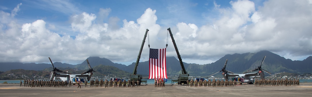 U.S. Marines with Marine Aircraft Group 24 participate in a change of command ceremony, Marine Corps Air Station Kaneohe Bay, Marine Corps Base Hawaii, June 17, 2022. Col. Brian Koch relinquished command to Col. Manlee Herrington. (U.S. Marine Corps photo by Lance Cpl. Isaiah Hill)