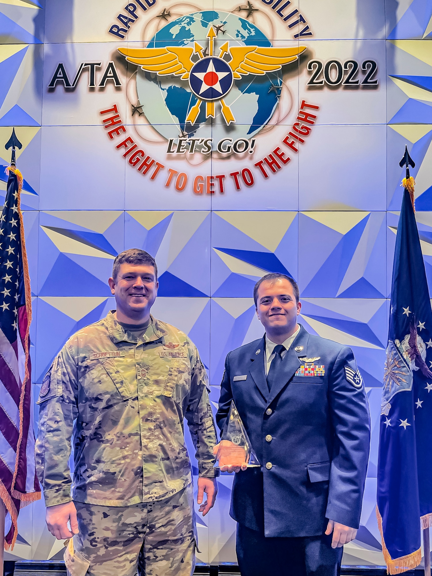 Staff Sgt. Cristopher Veach, 415th Special Operations Squadron instructor loadmaster, poses for a photo with Senior Master Sgt. Michael Schoettlin, 415th Special Operations Squadron senior enlisted leader in Denver, Colorado, Oct. 28, 2022. Veach recently won the Robert “Dutch” Huyser Award in the loadmaster category. (U.S. Air Force courtesy photo.