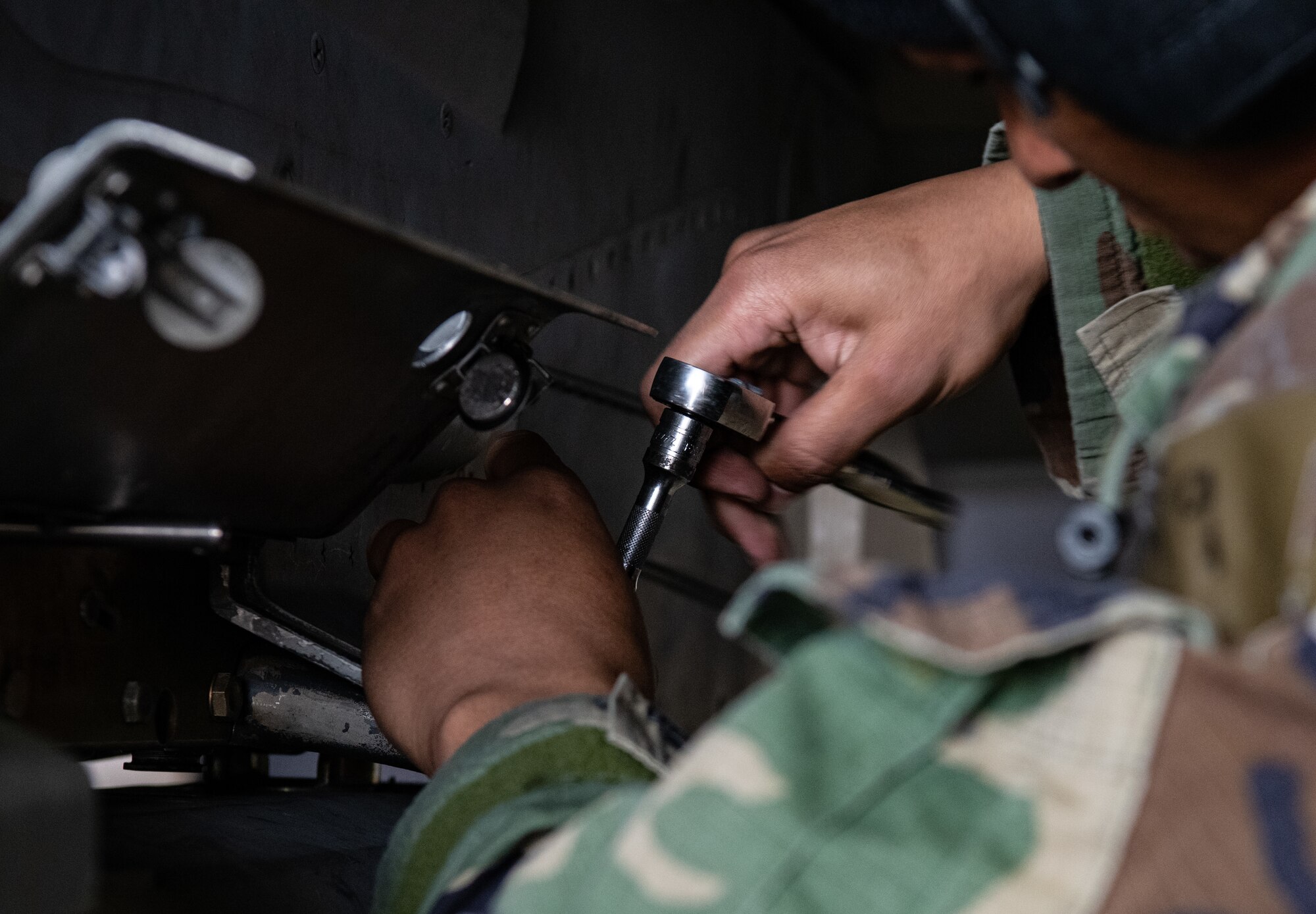 U.S. Air Force Staff Sgt. Tristan Bowen, 80th Fighter Generation Squadron weapons load crewmember, connects a guided-bomb unit-31 (GBU-31) to an F-16 Fighting Falcon at Kunsan Air Base, Republic of Korea, Nov. 2, 2022.