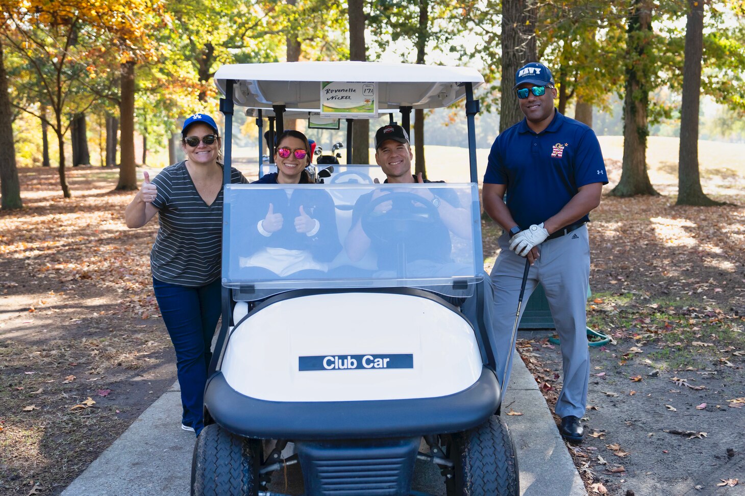 Pictured from left to right Jill Ravenelle, Ltjg Brittany Armand, LT Ross Nickel, and CDR Yerodin "Chili" Mac.