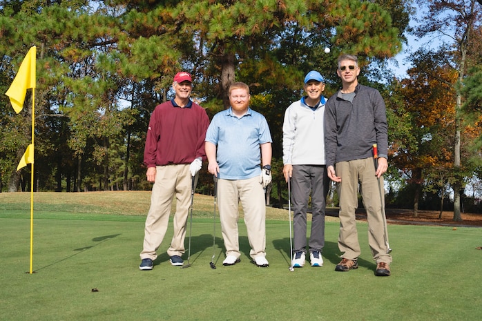 Pictured from left to right Kevin Denham, Mark Rashford, Kenneth "Pepe" Enriquez, Director War games, and NWDC Chief of Staff, Captain David Aamodt.