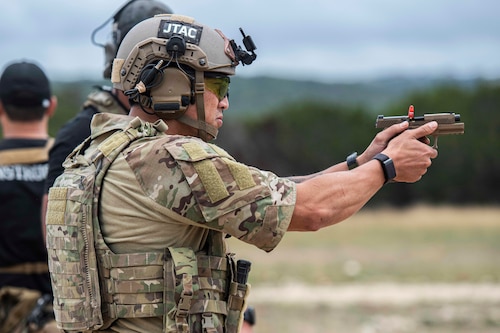 A U.S. Air Force Tactical Air Control Party (TACP) specialist fires his weapon to hit targets during the TACP 2022 Lightning Challenge at Joint Base San Antonio-Camp Bullis, Texas, Nov. 4, 2022. Lightning Challenge tests United States Air Force TACP Airmen through competition in agile combat employment, physical ability and marksmanship in order to identify the most outstanding multi-capable Airman in the world, prepared to fight and win on the all-domain battlefields of the future. (U.S. Air Force photo by Tristin English)