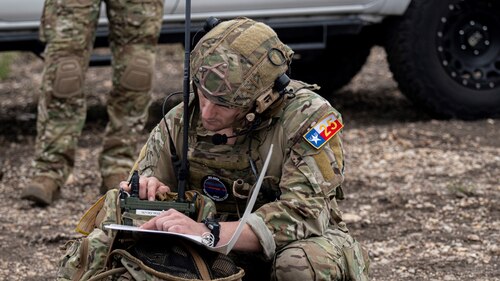 A Tactical Air Control Party Airman programs his radio during Lightning Challenge 2022. Lightning Challenge is an annual service-level competition to identify the best TACP Airmen in the AF.