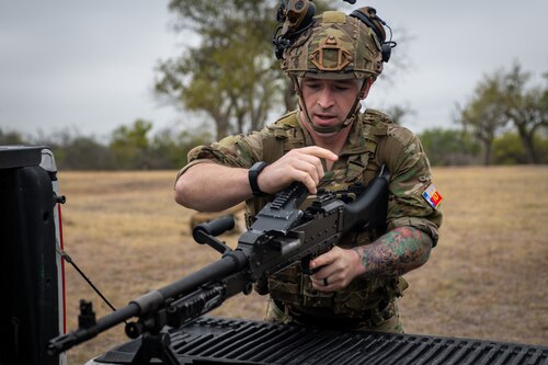 A Tactical Air Control Party Airman disassembles and assembles a M-240 machine gun during Lightning Challenge 2022, at Joint Base San Antonio-Chapman Annex, Texas, Nov. 3, 2022. The Lightning Challenge is an annual service-level TACP competition to identify the best TACP Airmen in the Air Force.