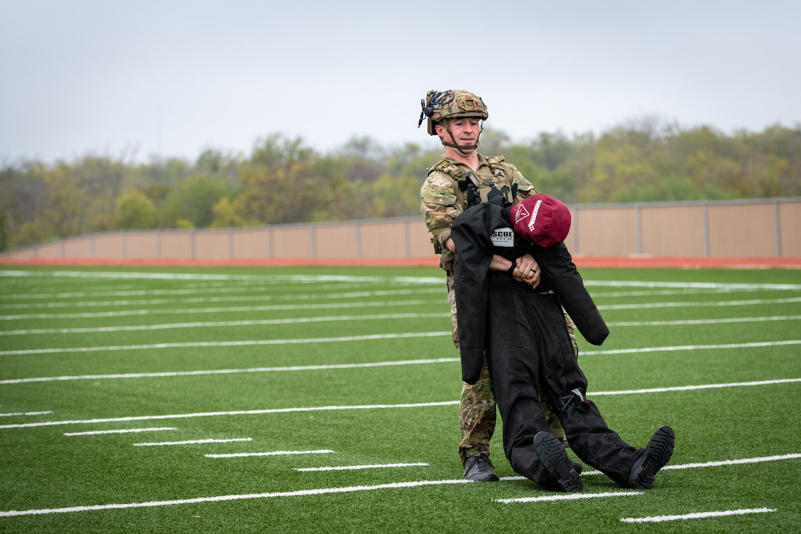 A Tactical Air Control Party Airman executes a casualty evacuation exercise during Lightning Challenge 2022, at Joint Base San Antonio-Chapman Annex, Texas, Nov. 3, 2022. The Lightning Challenge is an annual service-level TACP competition to identify the best TACP Airmen in the Air Force.