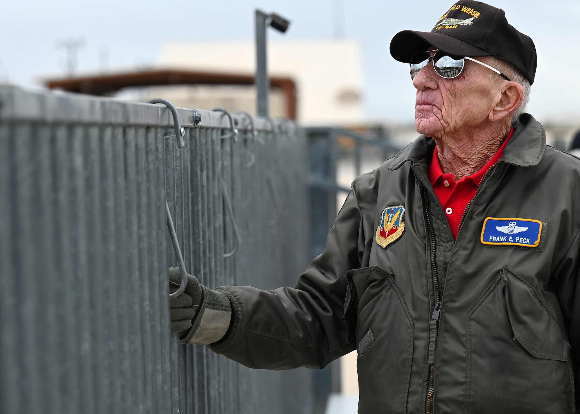 photo of a veteran watching a flying demonstration
